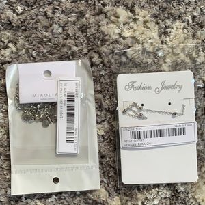 Silver charm bracelet and a beaded one